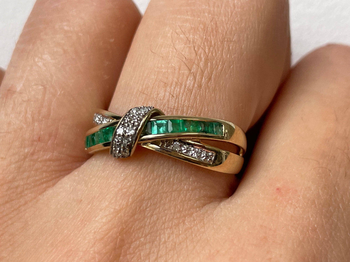 Emerald and diamond crossover ring - The Goldfinch Collection