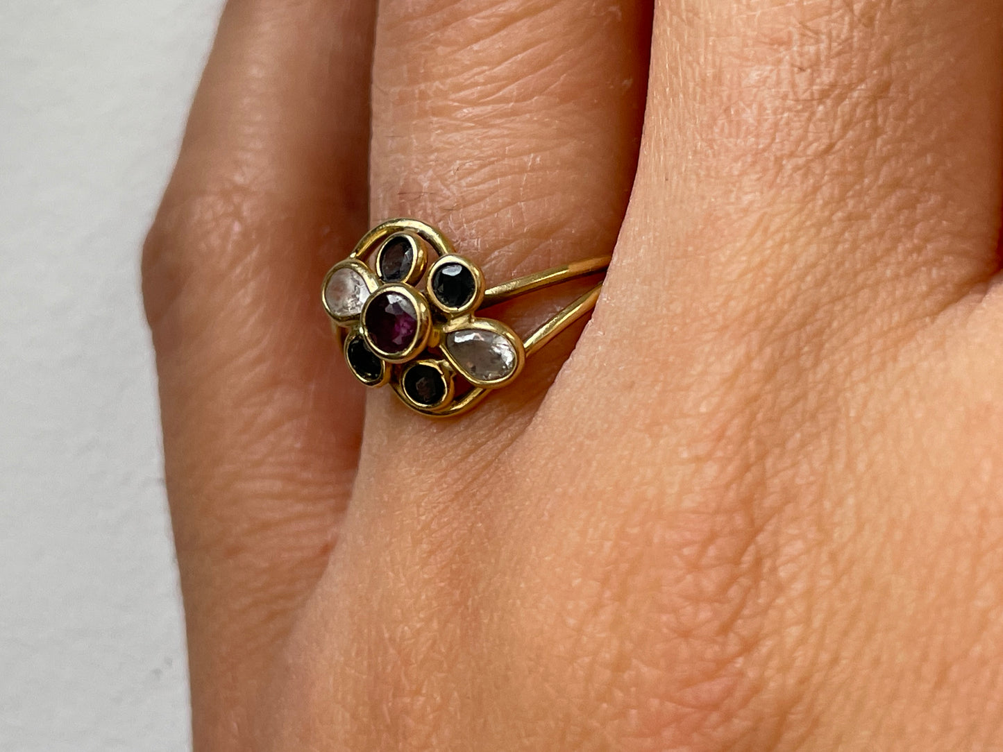 18ct solid gold ring with garnet and white and blue sapphires - The Goldfinch Collection