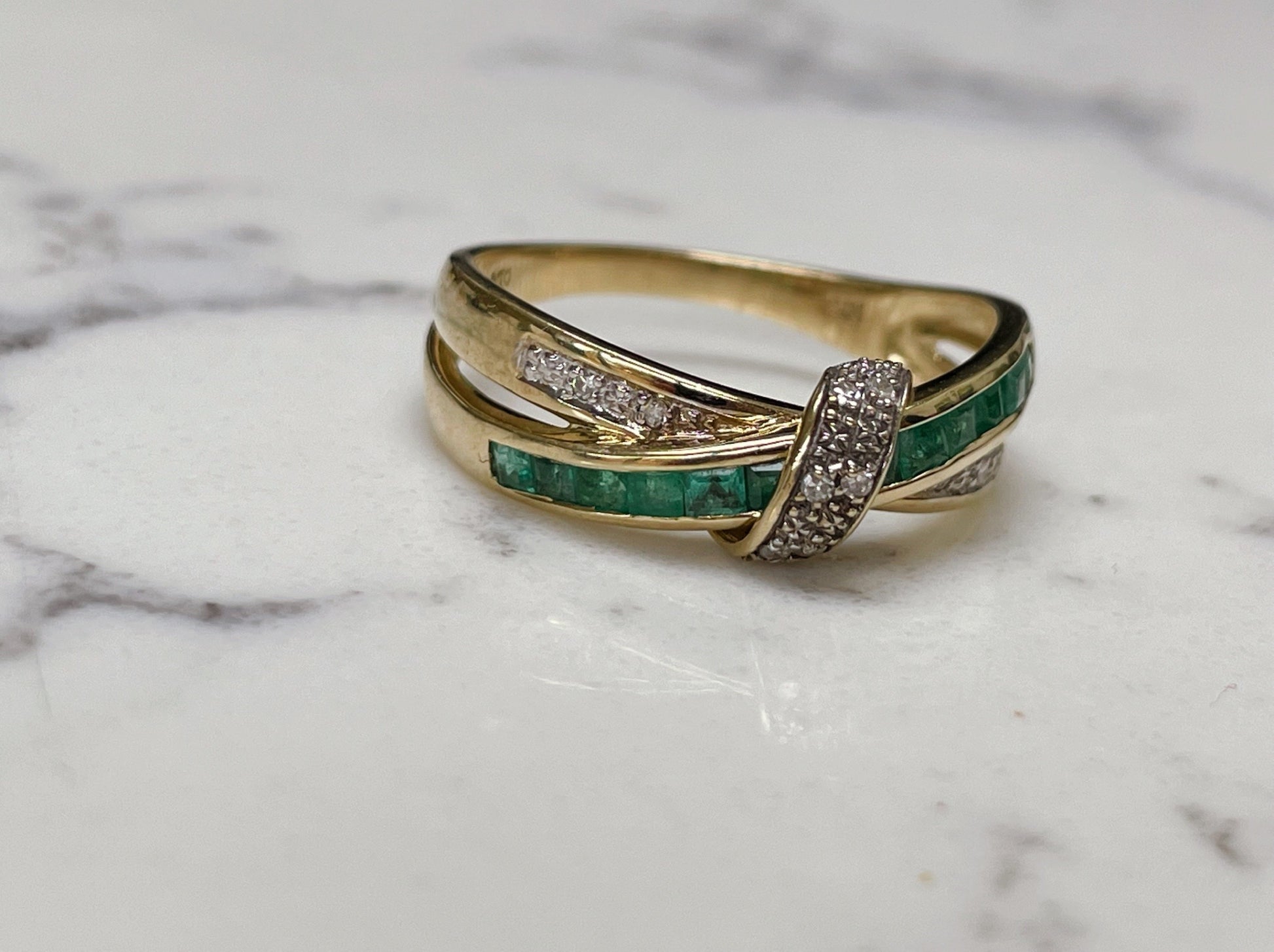 Emerald and diamond crossover ring - The Goldfinch Collection