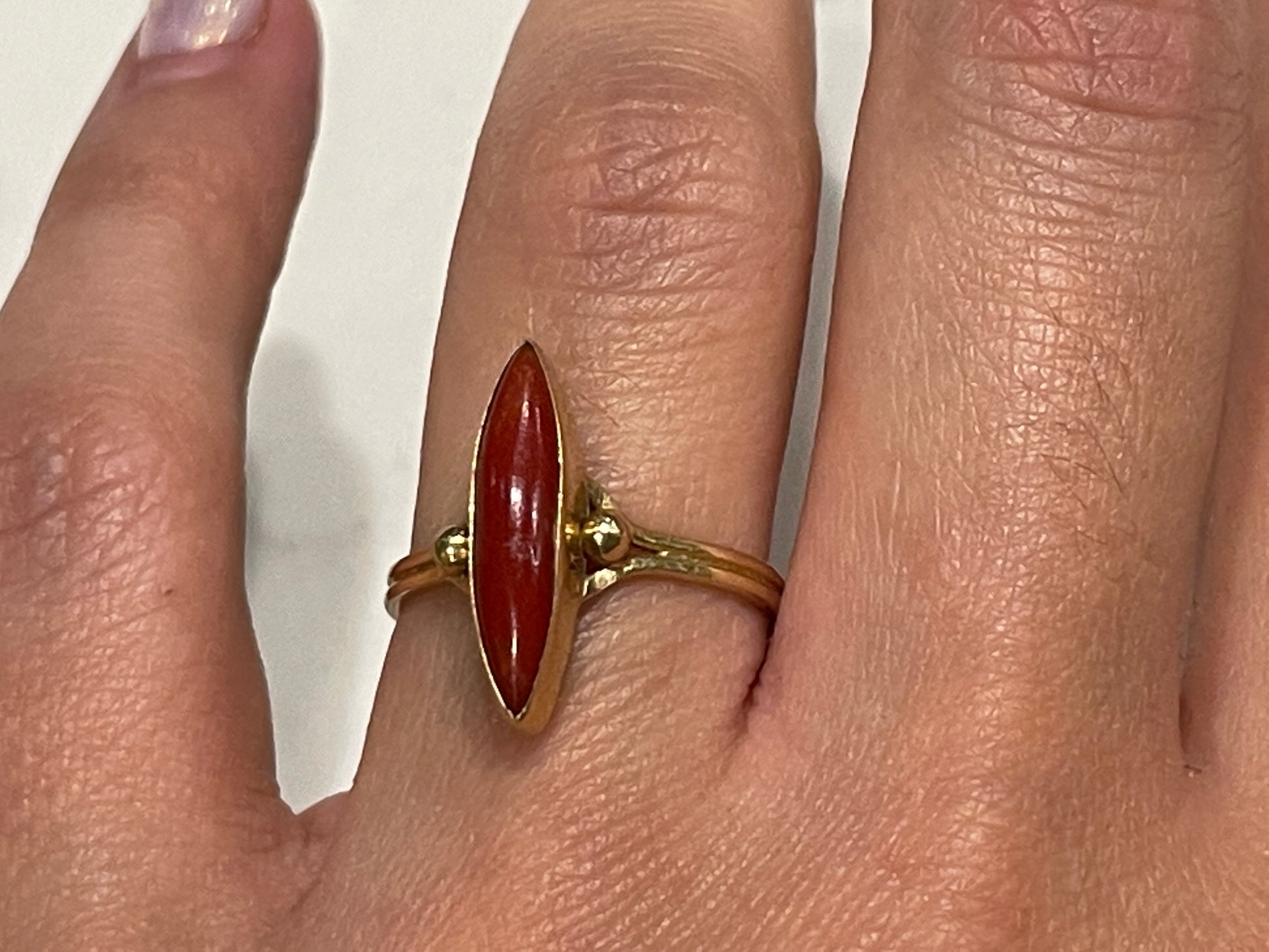 1920s 18ct yellow gold Marquise Cut Coral ring - The Goldfinch Collection