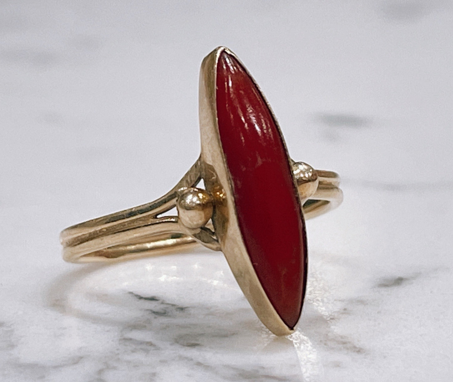 1920s 18ct yellow gold Marquise Cut Coral ring - The Goldfinch Collection