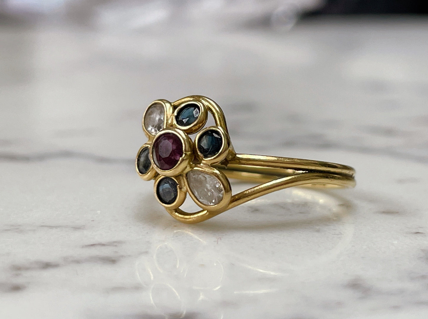 18ct solid gold ring with garnet and white and blue sapphires - The Goldfinch Collection