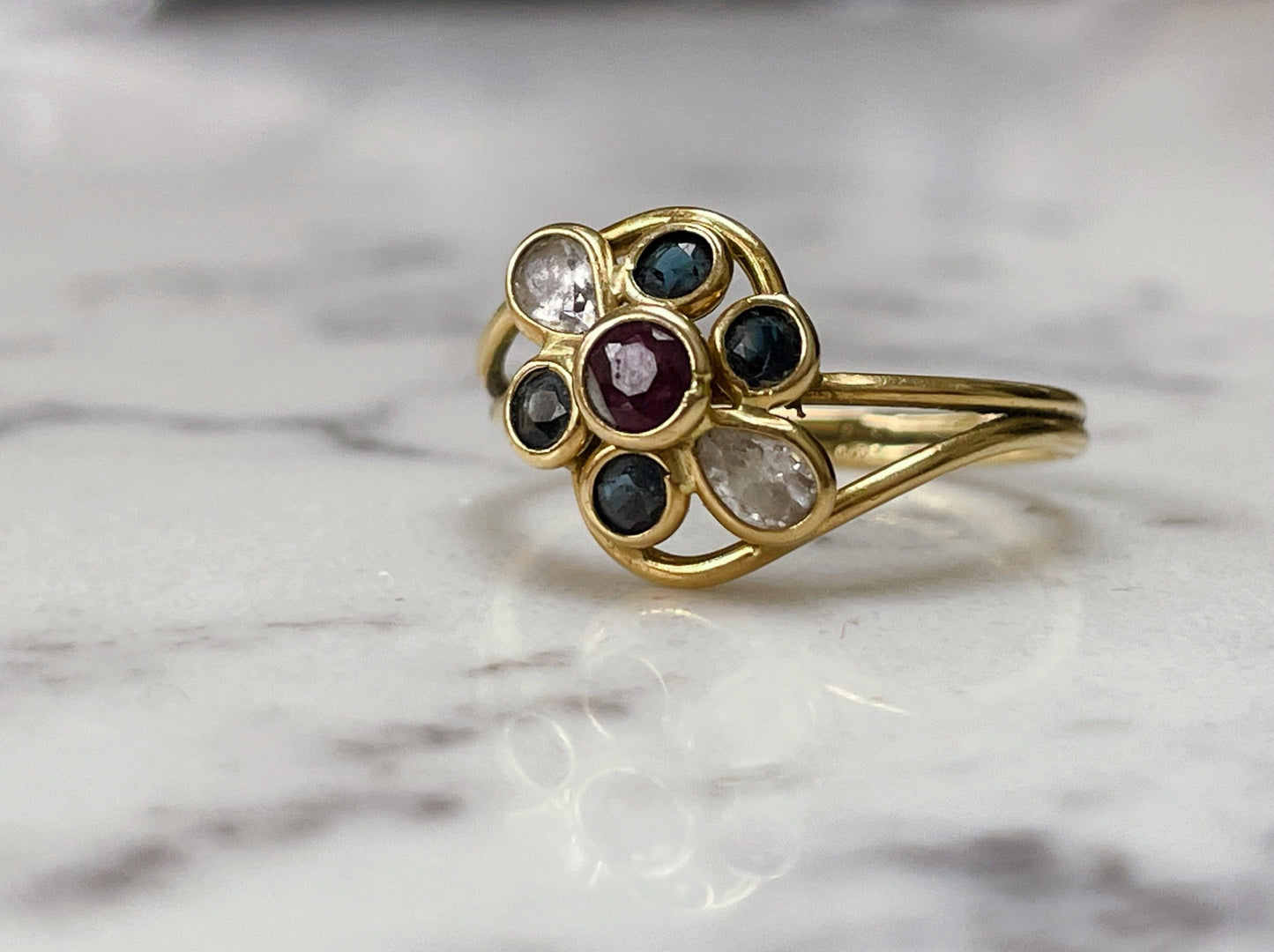 18ct solid gold ring with garnet and white and blue sapphires - The Goldfinch Collection