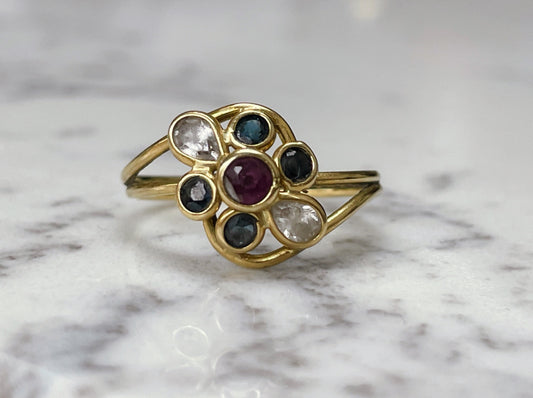 18ct solid gold ring with garnet and white and blue sapphires - The Goldfinch Collection